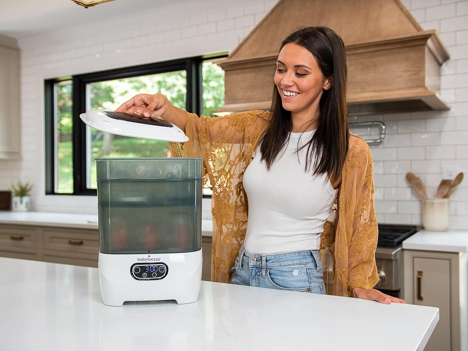 Baby Brezza Baby Bottle Sterilizer and Dryer Advanced Electric Steam Sterilization Machine Universal Sterilizing for All Bottles: Plastic + Glass + Pacifiers + Breast Pump Parts - HEPA Filtration